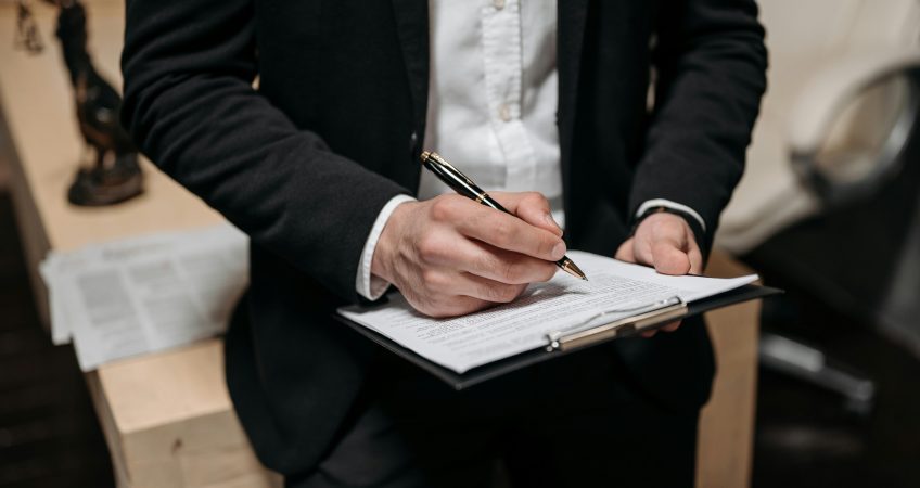 Los Angeles white collar crime lawyer discussing pretrial settlement options with client